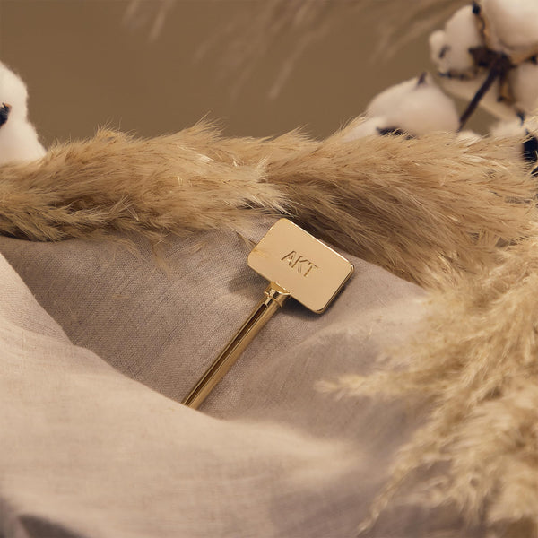 AKT, THE ASSISTANT. Tube squeezer key — The key to ZERO WASTE. 100% PLASTIC FREE & RECYCLABLE — Squeeze out every last drop of your NATURAL DEODORANT BALM from AKT LONDON